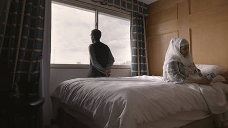 An Unfinished Journey / Zefnoon Safi and son in Calgary hotel room